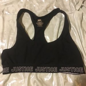 Small black sports bra with justice print